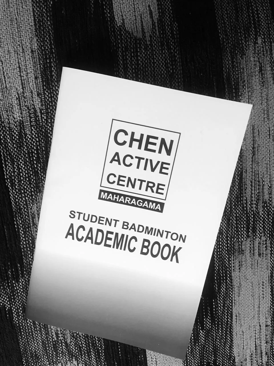 Chen Active Centre student badminton academic book